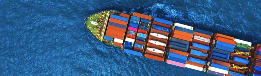 Container ship loaded with export containers at sea